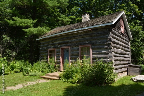 Fototapeta A log blacksmith's house built in the early 19th century in Canada.