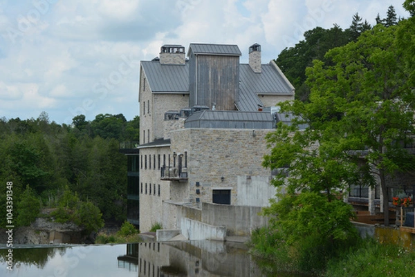 Fototapeta Elora grist Mill. Originally built in the 19th century above the thundering falls of the Grand River and Elora Gorge 