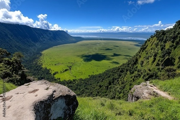 Obraz Ngorongoro Crater in Tanzania, with its lush green floor and abundant wildlife, viewed from the rim of the crater