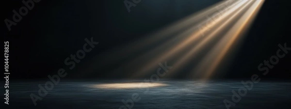 Fototapeta A striking composition featuring soft light beams on a dark, minimalistic background. This image evokes a serene and peaceful mood, perfect for creative projects.