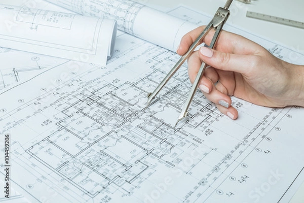 Obraz Architect working on blueprint