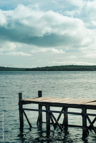 Fototapeta The pier for boats landing in Pulau Cendekian, Karimunjawa, Indonesia