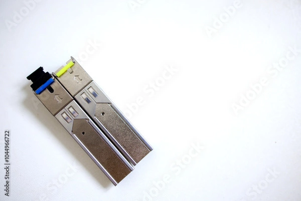 Fototapeta optical transceiver modules on a plain background