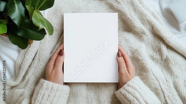 Fototapeta Woman's hands open empty catalog, magazines, book mockup