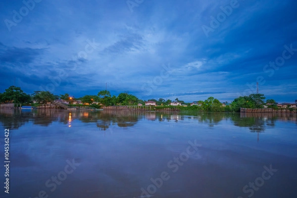 Fototapeta Amazonian national reserve Cuyabeno in Ecuador, wetland with lakes and ponds, river with piranas, dolphins, caymans, snakes and birds, aerial landscape view, green forest.