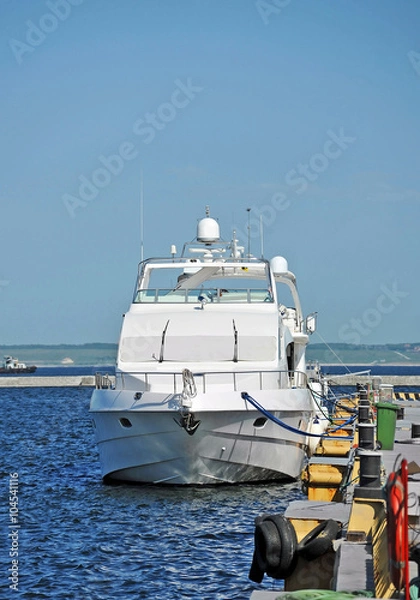 Fototapeta Motor yacht in jetty