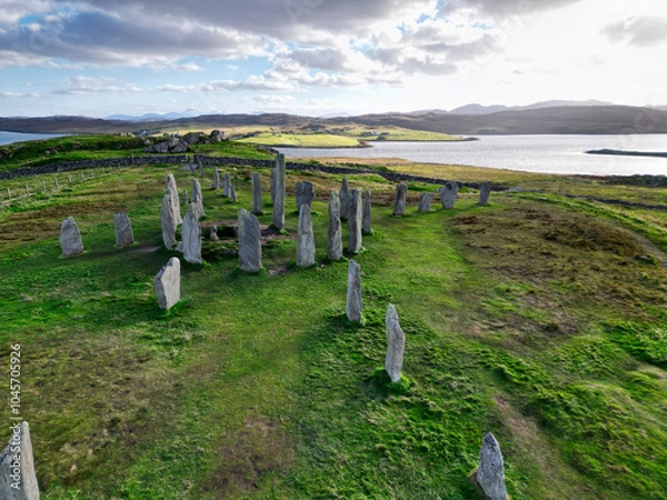 Obraz The ancient standing stones of Callanish (or Calanais) on Lewis in the Outer Hebrides of Scotland at sunset