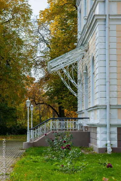 Obraz Side view of concrete steps and railing leading to entrance to the estate.  Igate, Latvia.