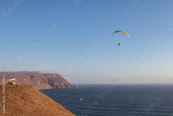 Obraz paragliding on the beach