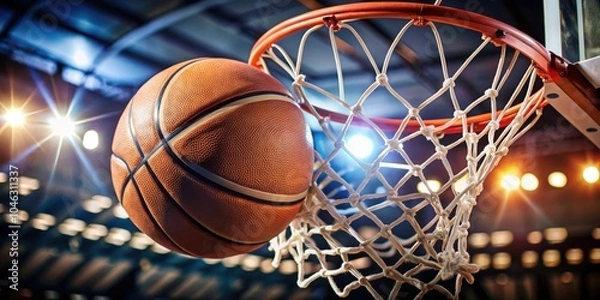 Fototapeta Closeup of basketball going through net for a score, basketball, net, hoop, score, points, game, sports, closeup, action