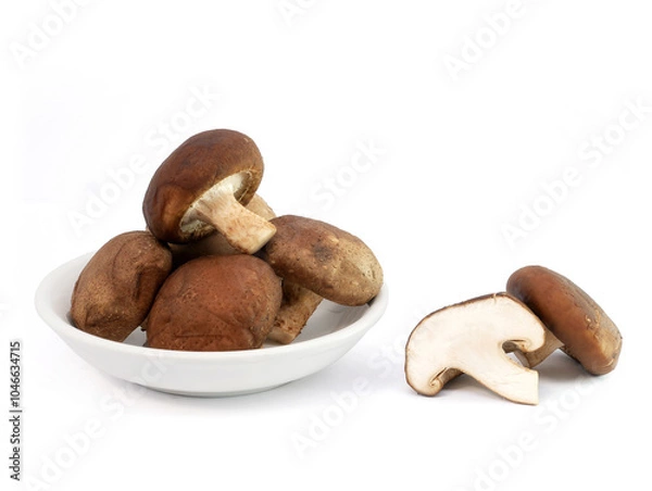 Fototapeta Fresh shiitake mushrooms In a bowl isolated on white background.