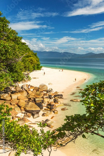 Obraz Picturesque tropical golden Nudey Beach with turquoise water on Fitzroy Island. It is a continental island southeast of Cairns, Queensland, Australia.