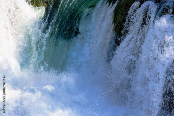 Obraz Water flowing from a waterfall