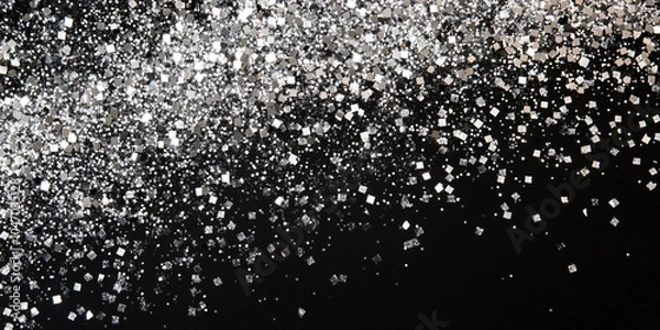 Fototapeta Black background with silver sparkles resembling confetti