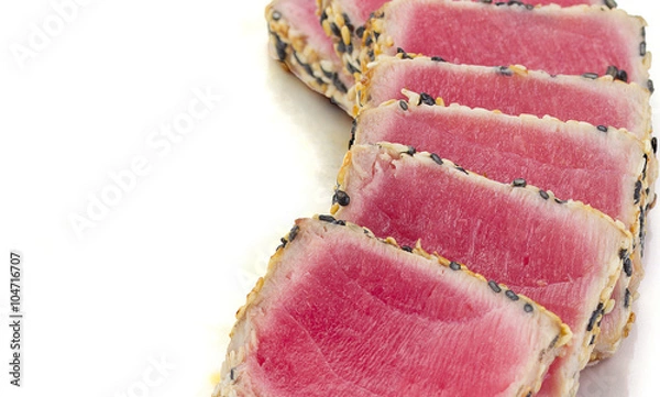 Fototapeta Tuna filet with sesame isolated on white background