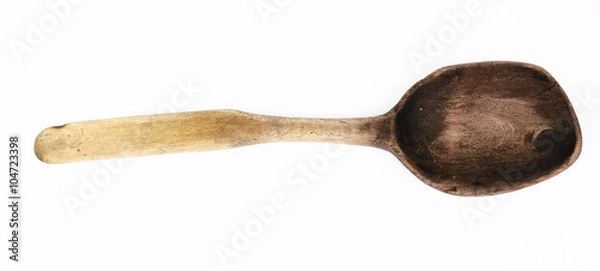 Fototapeta Used self-made wooden spoon isolated. Close-up top view of wooden spoon isolated over white. Wooden spoon on isolated background. Wooden spoon with long handle