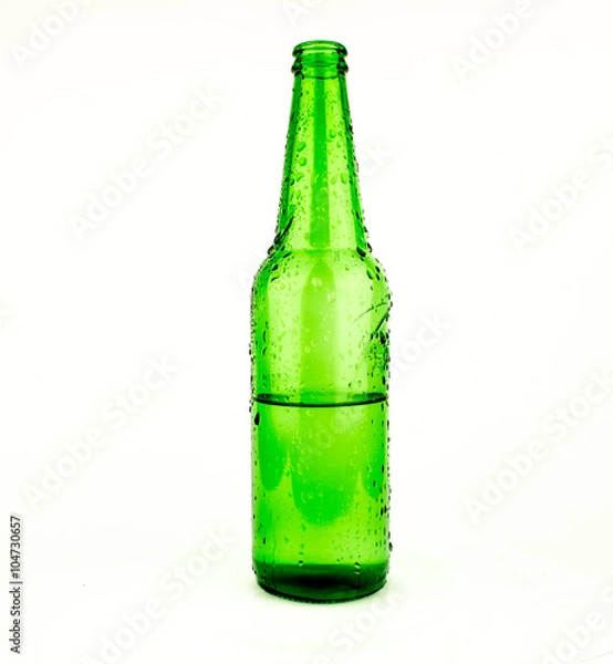 Fototapeta Beer bottles of green glass background, glass texture / green bottles / Bottle of beer with drops on white background. With clipping path / Texture water drops on the bottle of beer.
