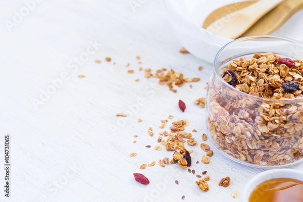 Obraz healthy breakfast. Granola on white background, space for text