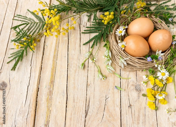 Obraz Яйца, мимоза и цветы как символы приближающегося праздника Пасхи