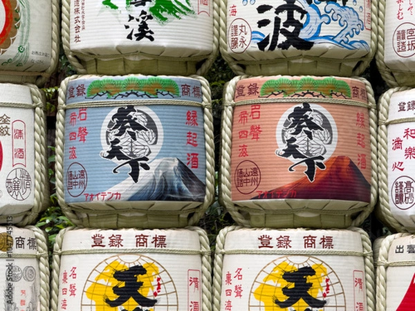 Fototapeta Japanese sake barrels are beautifully arranged in a display that captures attention