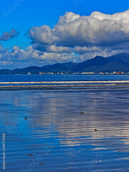 Obraz water mirror formed by the tide, reflecting the intense blue of the sky, on Do Indaia beach.