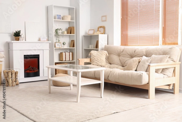 Fototapeta Interior of modern living room with comfortable sofa and table