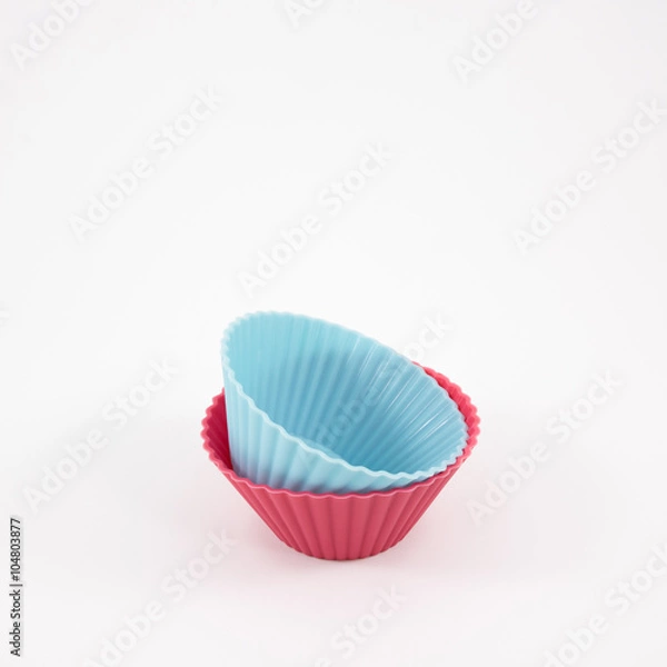 Fototapeta The group of silicone baking cup for make a cupcakes or muffins.