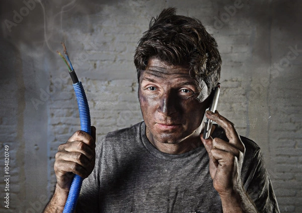 Obraz young man calling for help after accident with dirty burnt face in funny sad expression