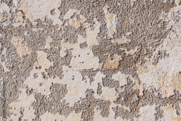 Fototapeta Concrete wall after sandblasting and peeling paint removed in preparation for painting