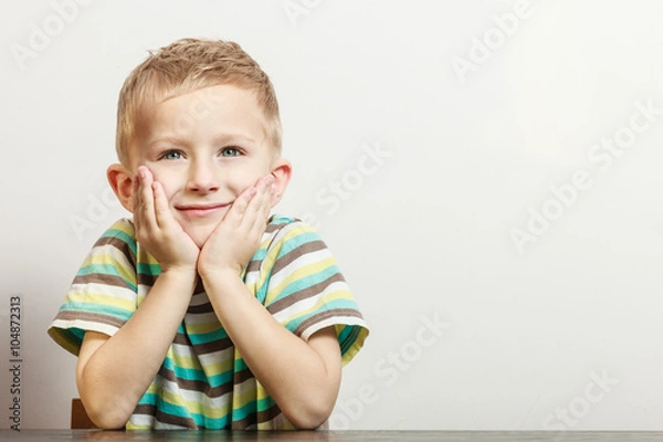 Fototapeta Little boy have fun with funny gestures