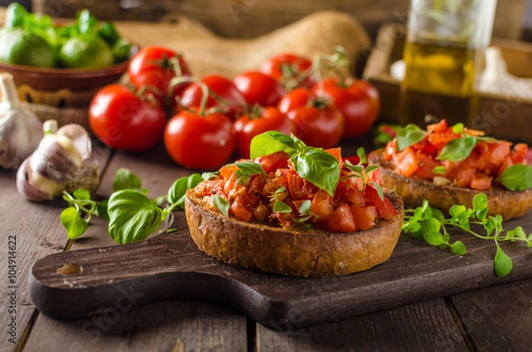Obraz Włoska bruschetta z pieczonymi pomidorami i czosnkiem