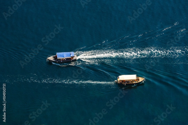 Fototapeta View from the top down by two passenger ship passing by