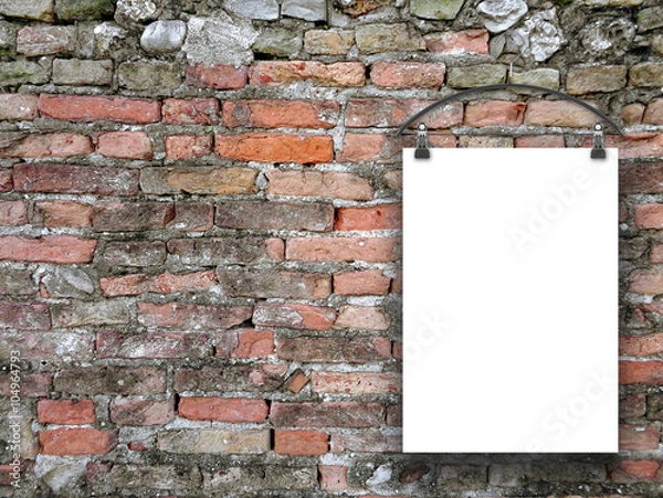 Obraz Close-up of one hanged paper sheet with clothes hanged on old weathered brick wall background