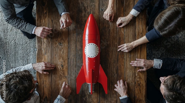 Fototapeta hands aroung a rocket