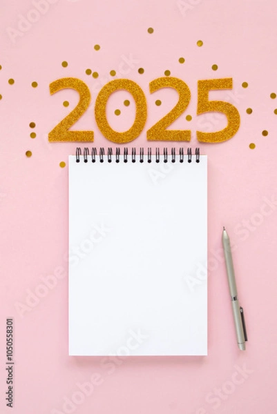 Obraz 2025 New Year concept with empty notebook for your goals, plans, resolutions. Flat lay style. Christmas planning concept with space for text
