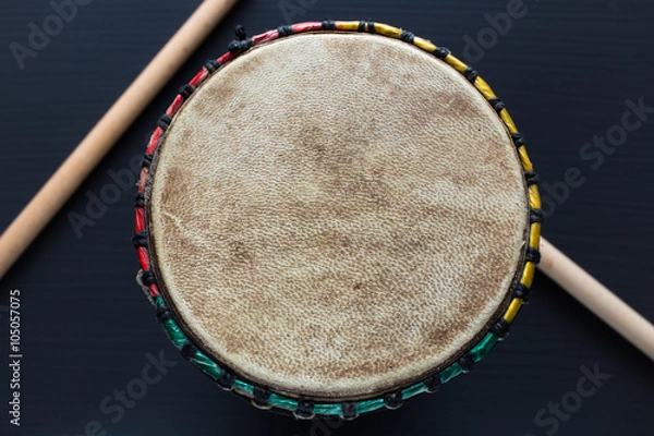 Obraz Djembe with drum sticks - Top view