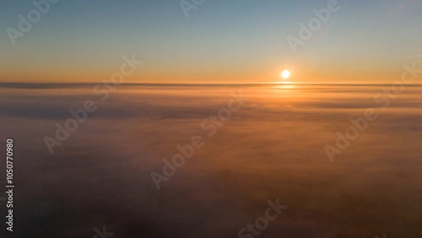 Obraz sunset on clouds