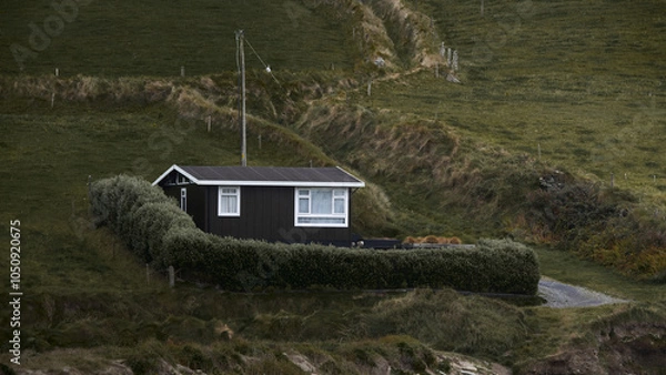 Fototapeta Tiny house on a hill