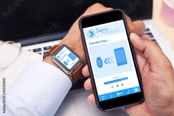 Obraz Smartphone and Smartwatch running transfer app