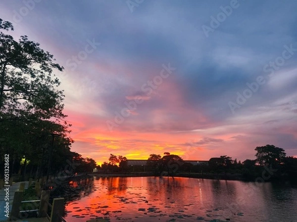 Fototapeta sunset over the river