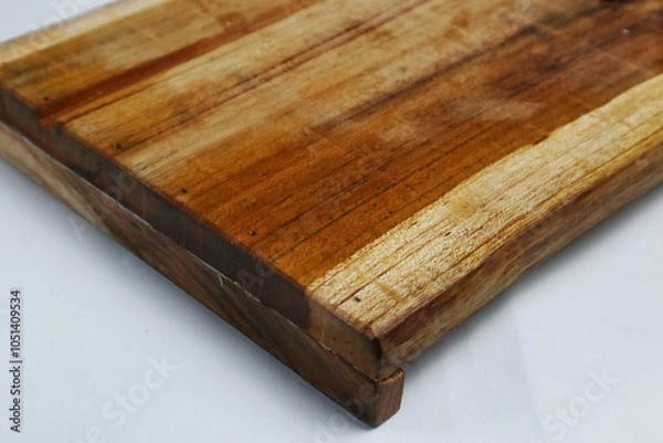 Fototapeta Square wooden cutting board isolated on white background with 45 degree angle setting
