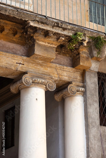 Fototapeta Ionic capitals on columns of a Palladian house.