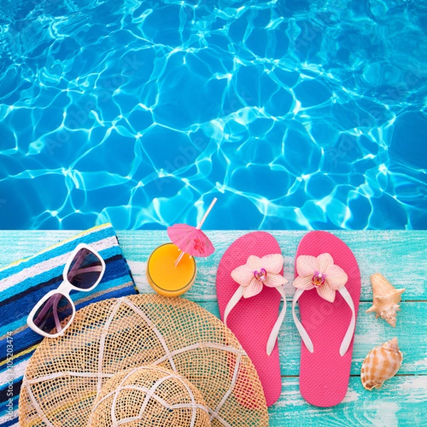 Obraz Summer Holidays in Beach Seashore. Fashion accessories summer flip flops, hat, sunglasses on bright turquoise board near the pool
