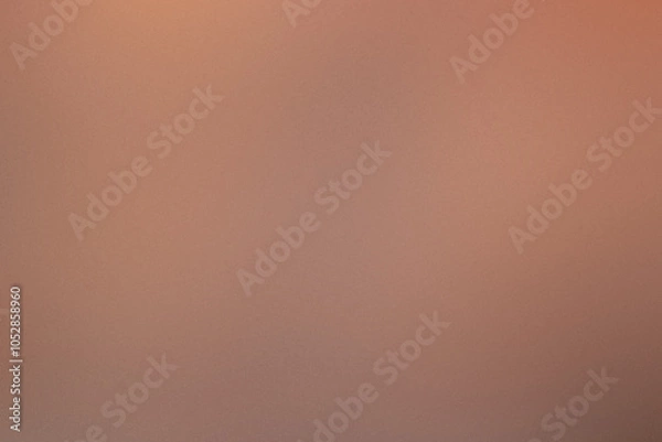 Fototapeta A brown background with a blurry image of a person. Noisy backdrop with grain