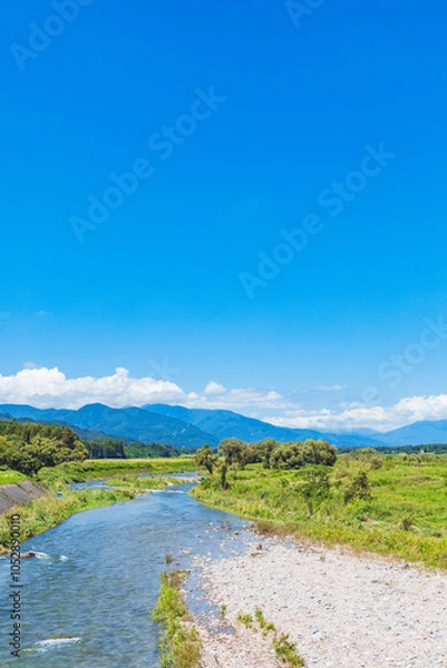 Obraz 青空と川の風景