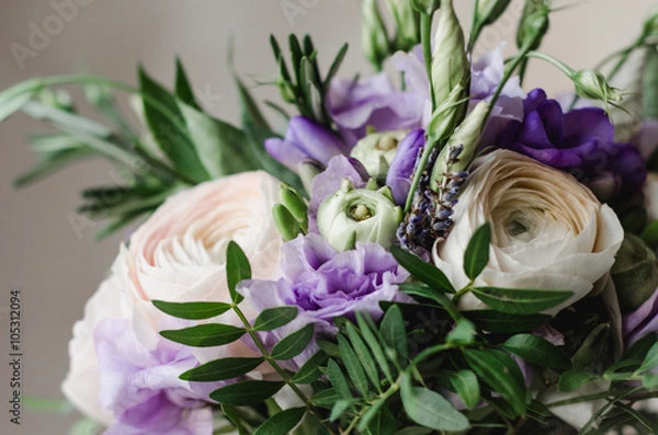 Obraz Beautiful rustic wedding bouquet of violet and white ranunculus lavender flowers with satin lilac tape on a white background