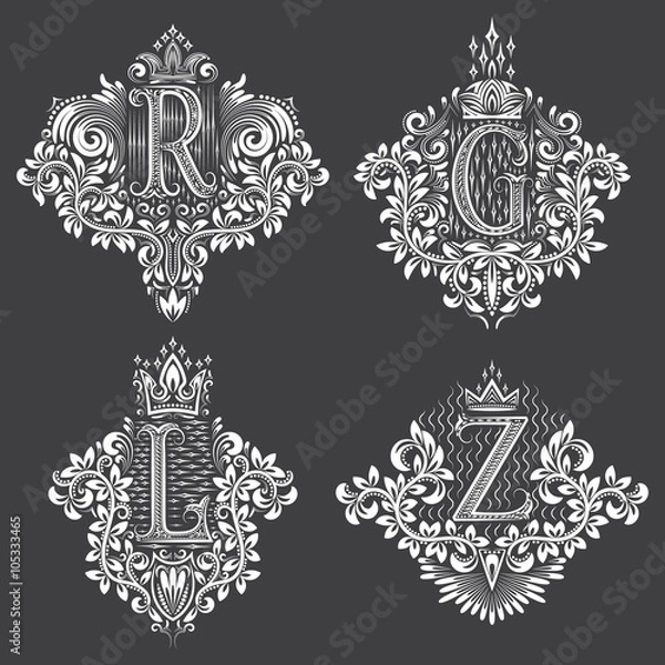 Obraz Set of ornamental monogram in coats of arms form. White floral decorations on black. Isolated tattoos in vintage baroque style.