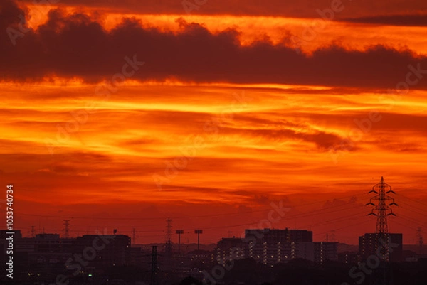 Fototapeta 朝焼けの雲と鉄塔