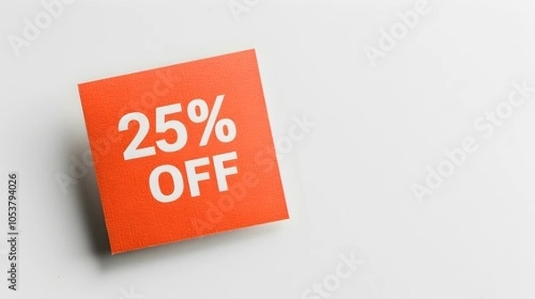 Fototapeta White '25% OFF' Text on a Light Orange Square Paper Note. White Background with Copy Space