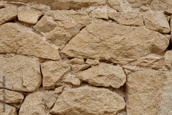 Fototapeta Stone Wall Background. Texture of sandstone